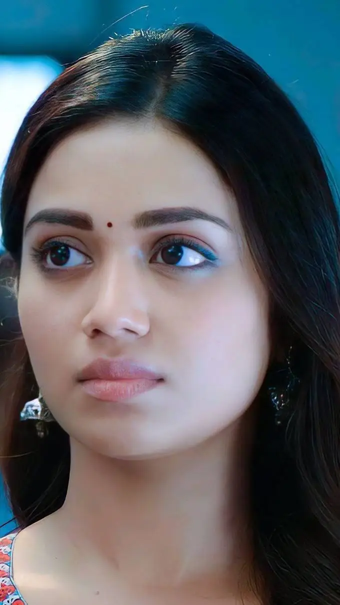 ai character: Nivetha pethuraj  background
