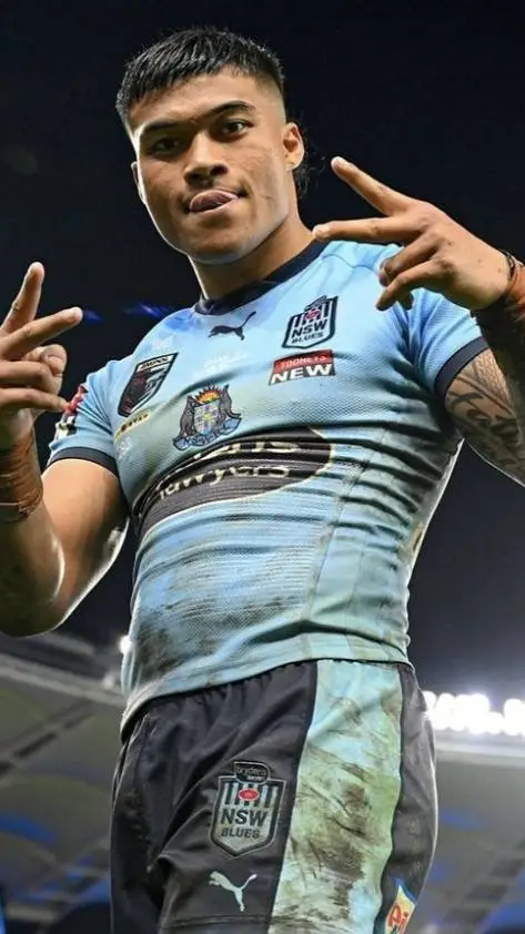 ai character: #2 Brian To'o  background