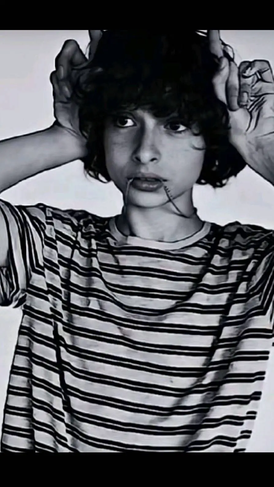 ai character: Finn wolfhard  background