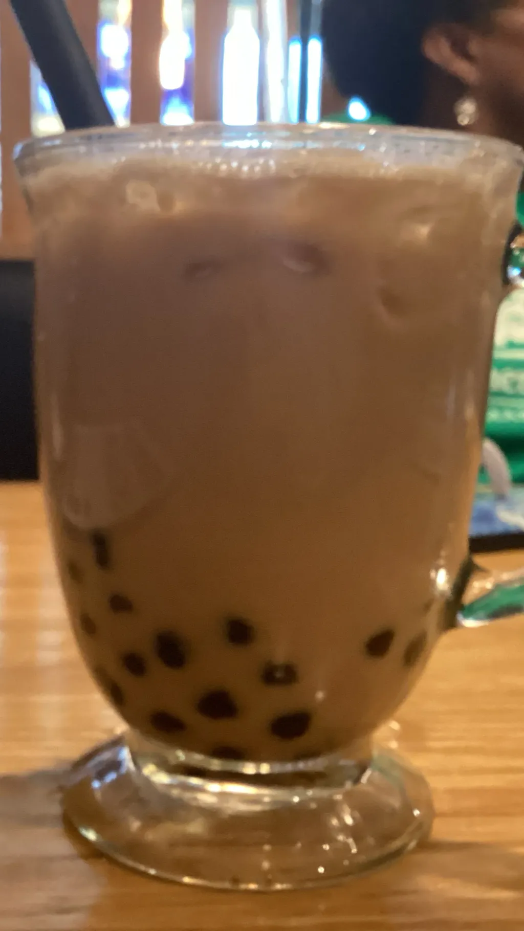 ai character: Boca tea store background