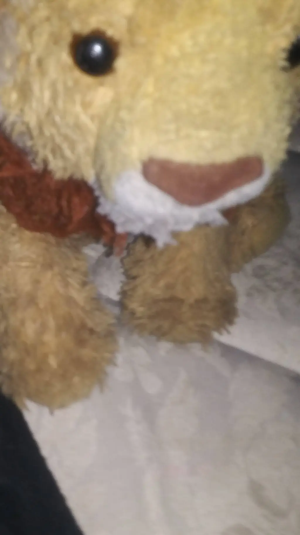 ai character: Stuffed lion background