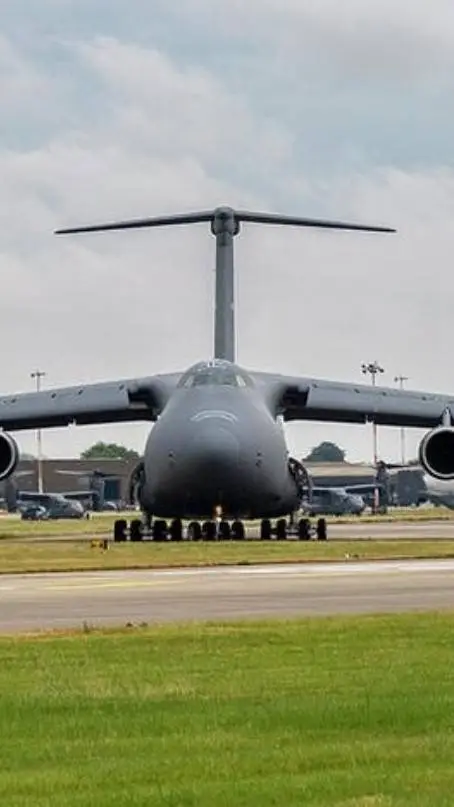 ai character: C-5M Super Galaxy background