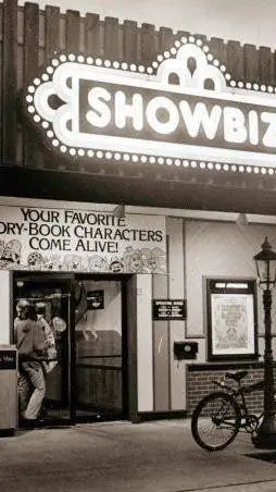 ai character: showbiz pizza  background