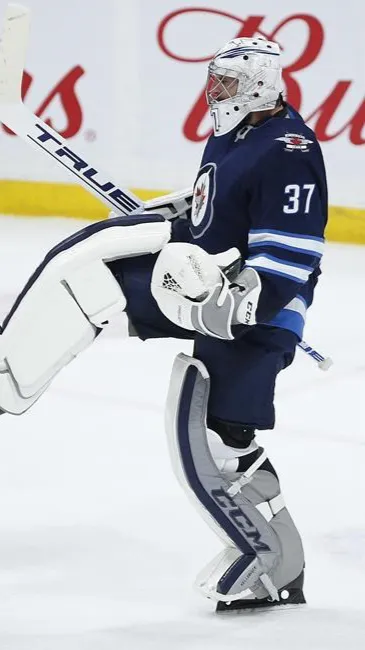 ai character: Connor Hellebuyck  background
