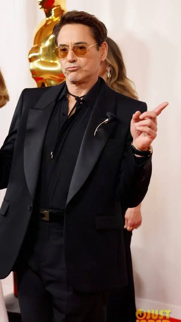 ai character: Robert Downey Jr  background