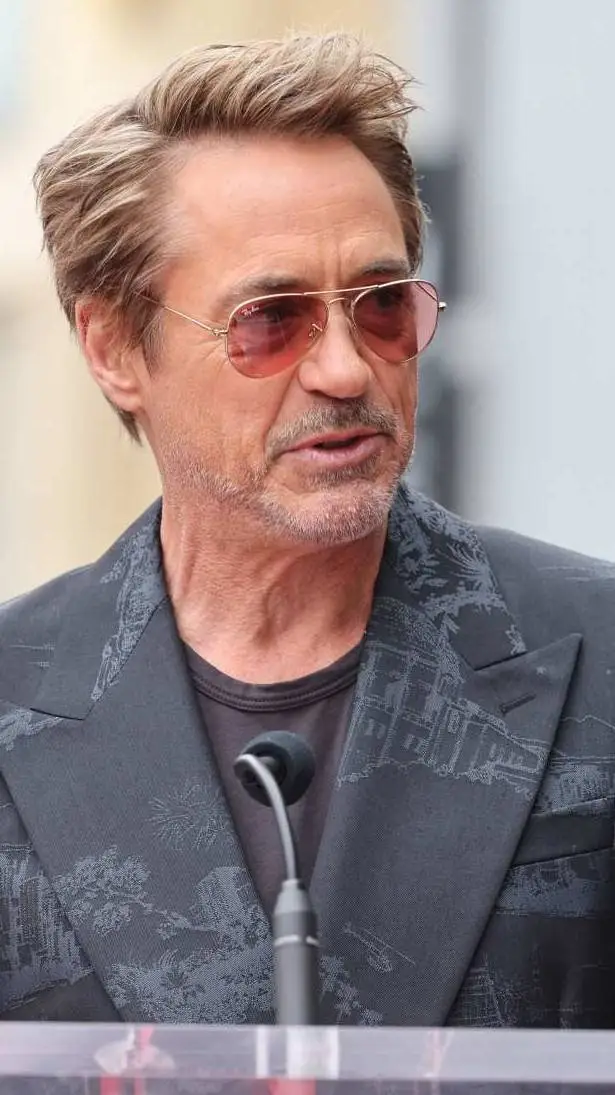 ai character: Robert downey jr  background