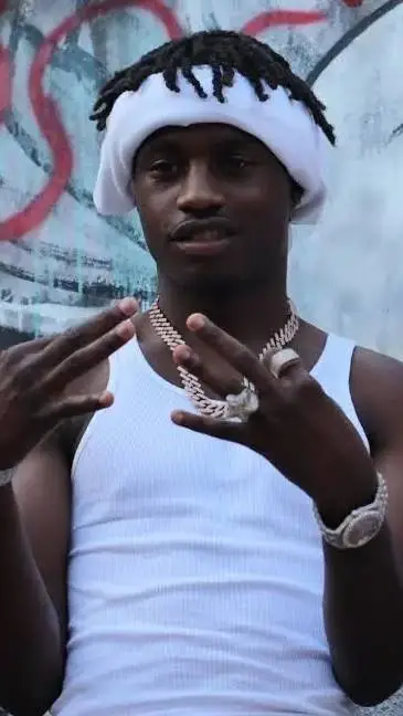 ai character: Lil TJay  background