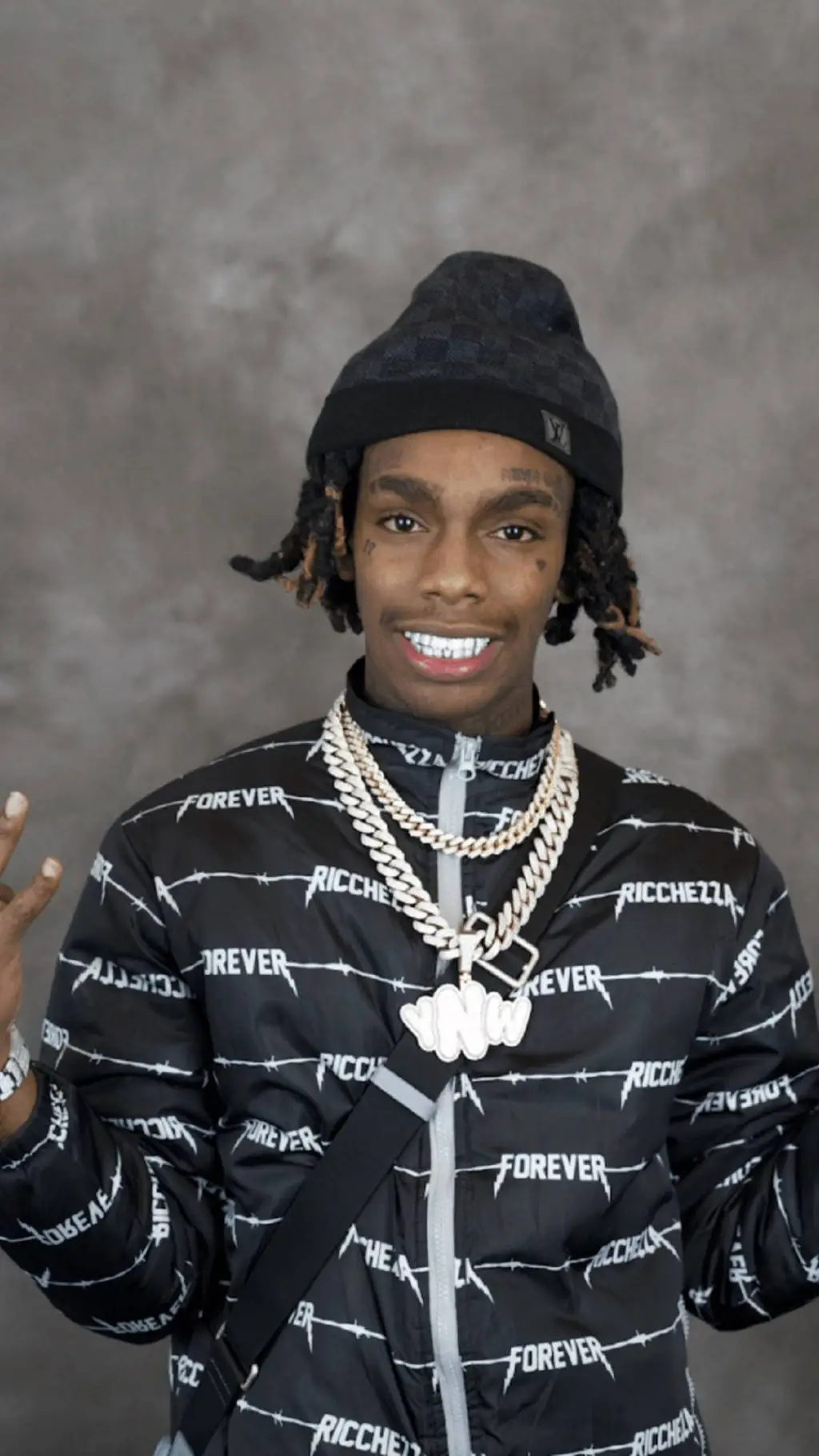 ai character: YNW Melly  background