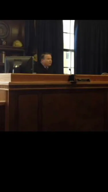 ai character: Judge john mcbain  background