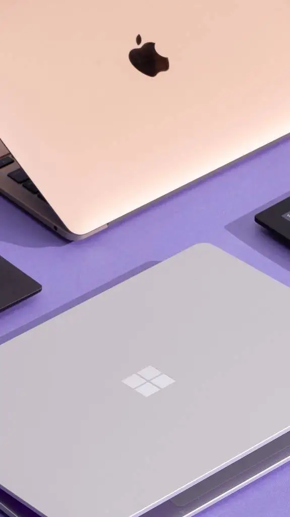 ai character: laptop universe background