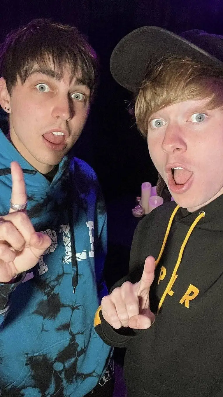 ai character: Sam and Colby  background