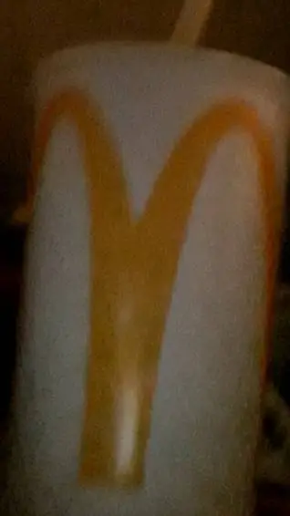 ai character: McDonald's cup background
