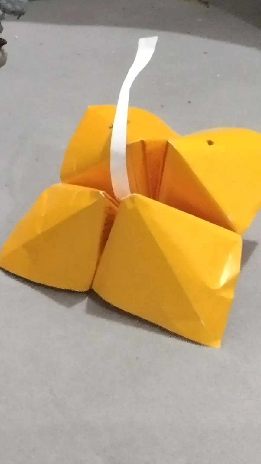 ai character: Paper Flower Spiri background