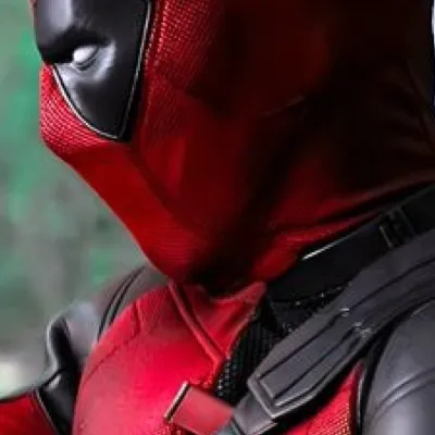 chat with ai character: Caption Deadpool