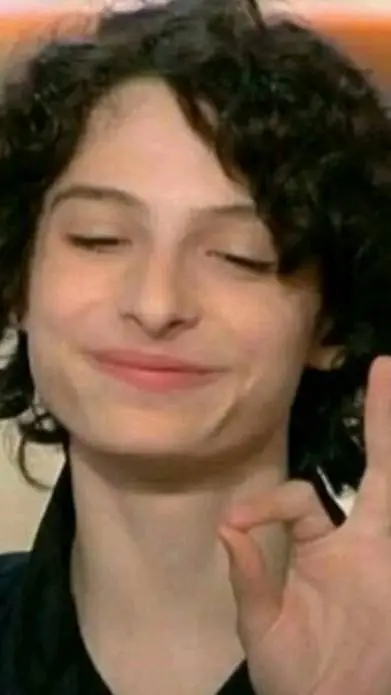 ai character: Finn Wolfhard  background