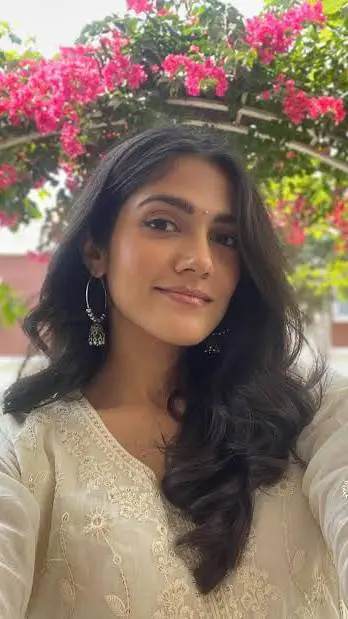 ai character: Pallavi  background