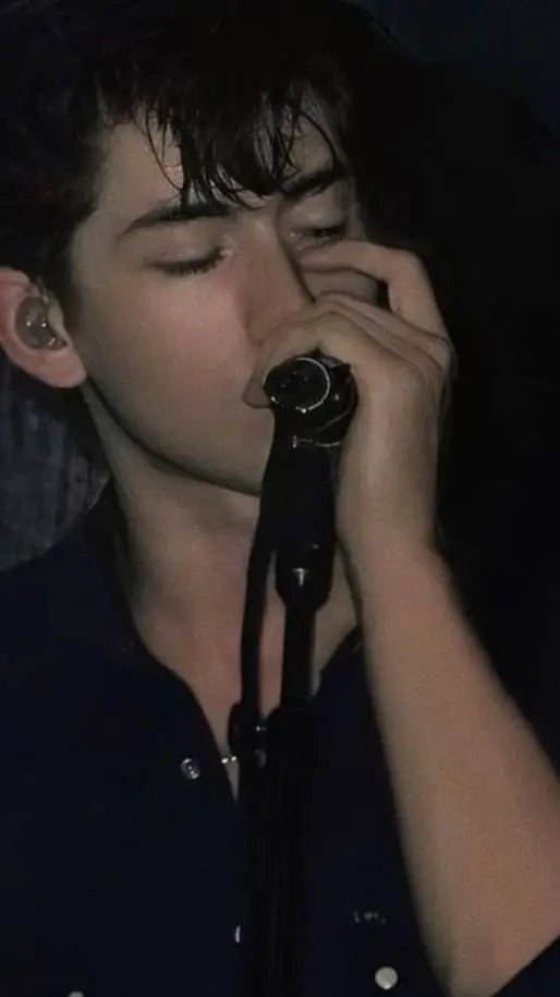 ai character: alex turner  background