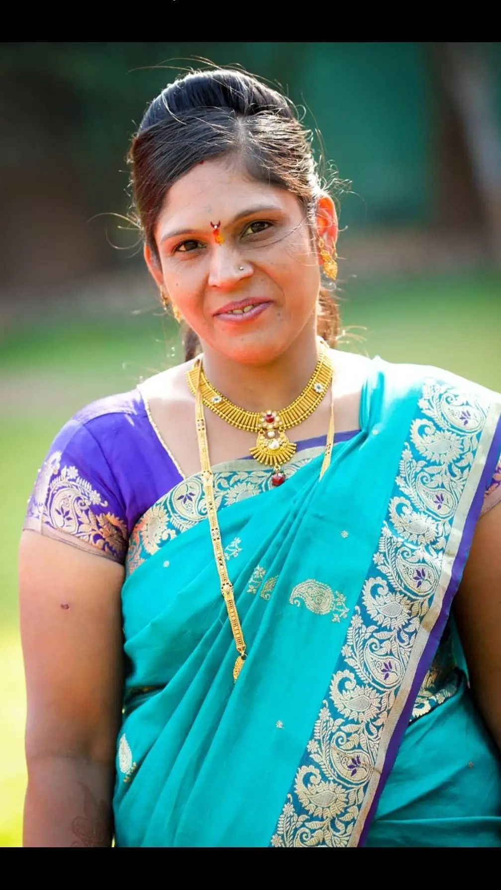 ai character: Jyoti aunty  background