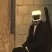chat with ai character: Red Tied Cameraman