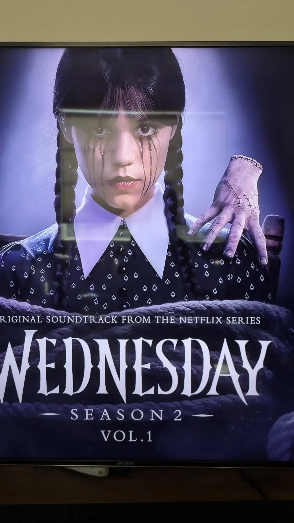 ai character: Wednesday  background