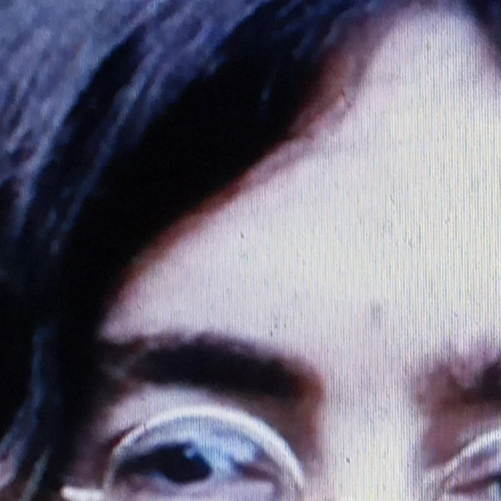 chat with ai character: John Lennon 