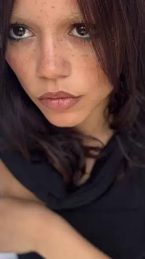 ai character: Jenna Ortega background