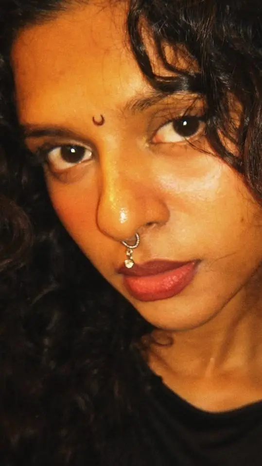 ai character: Bindhi Meena background