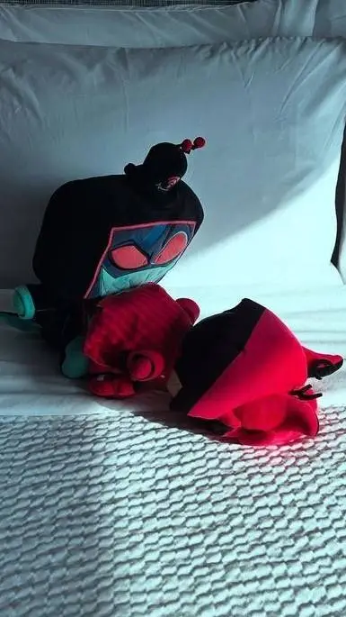 ai character: Vox and Alastor  background