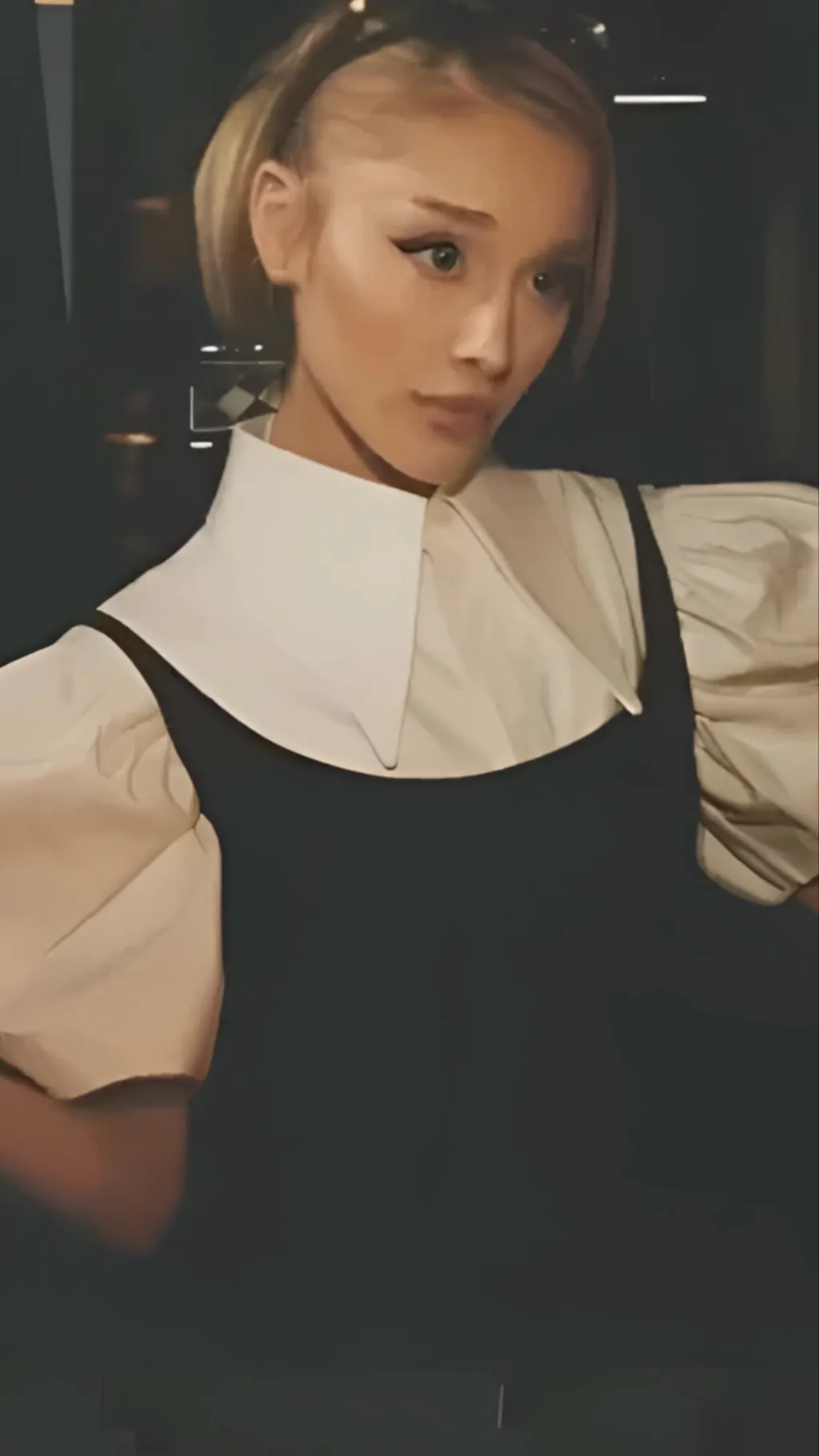 ai character: Ariana Grande background