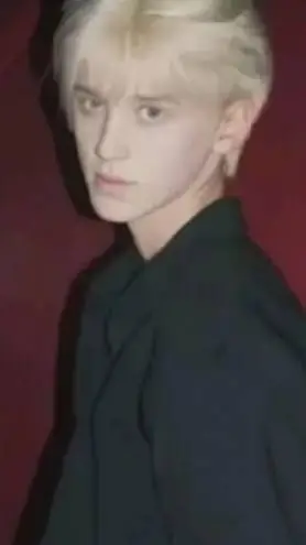ai character: Tom Felton  background