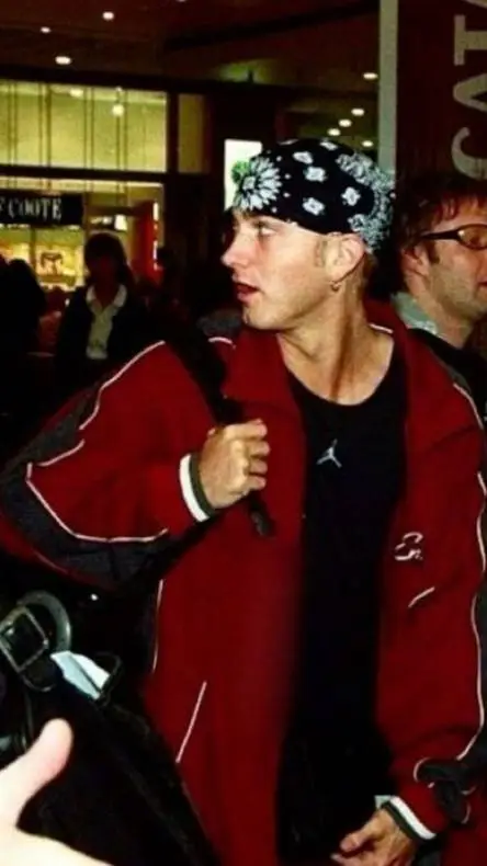 ai character: ~Eminem>>> background
