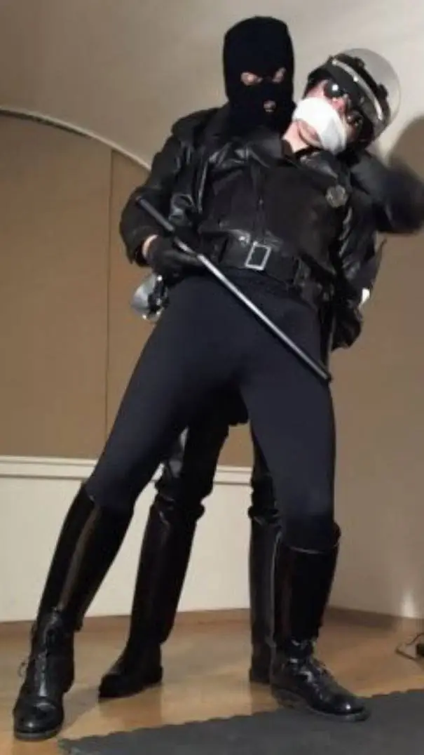 ai character: leather biker cop  background