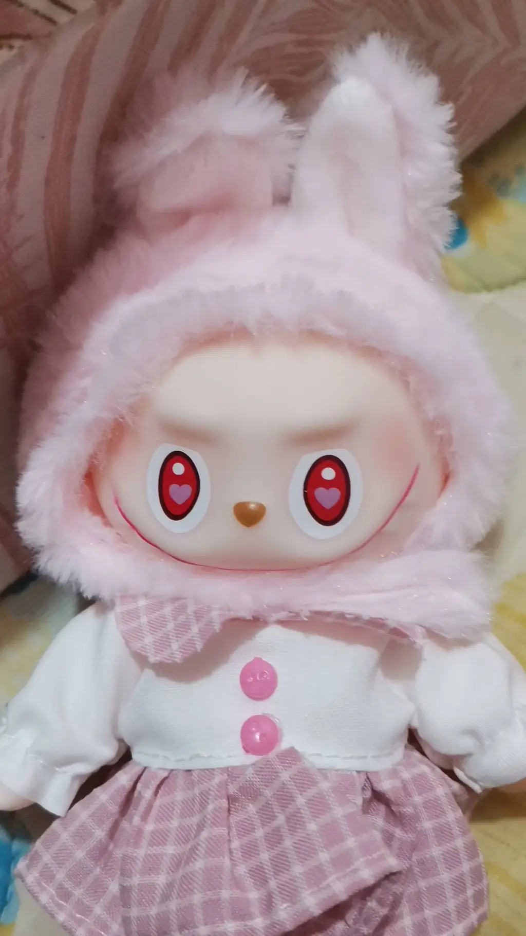 ai character: Pink labubu background