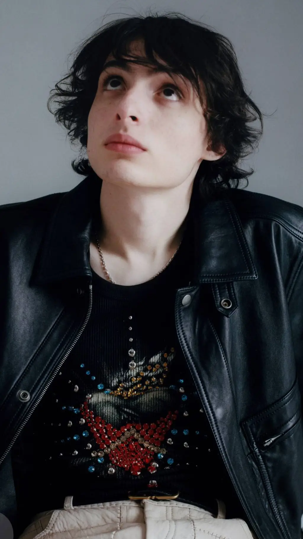 ai character: finn wolfhard  background