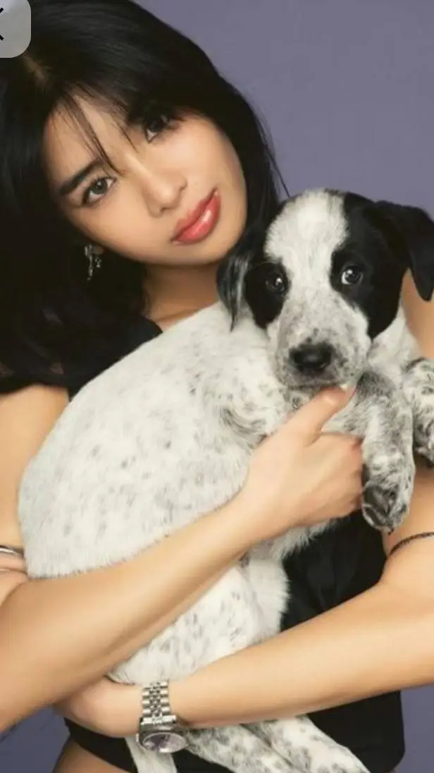 ai character: Sophia with puppy background