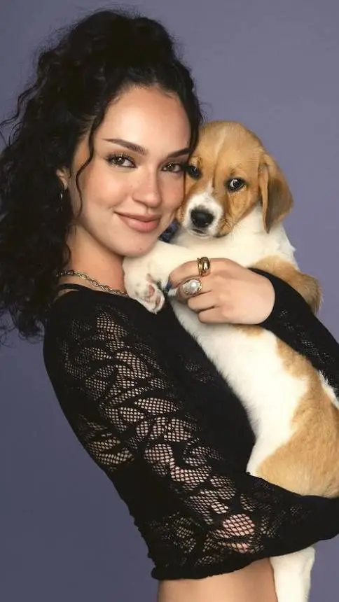 ai character: Daniela with puppy background