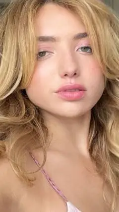 ai character: peyton list background