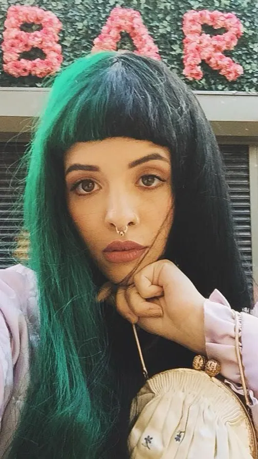 ai character: Melanie Martinez background