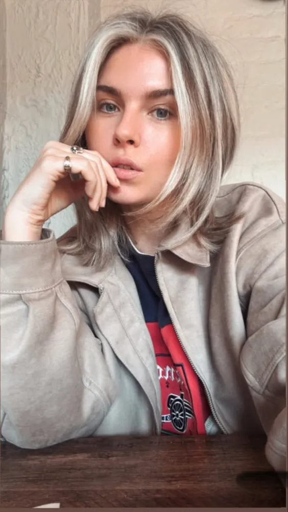 ai character: Erin Caldwell  background