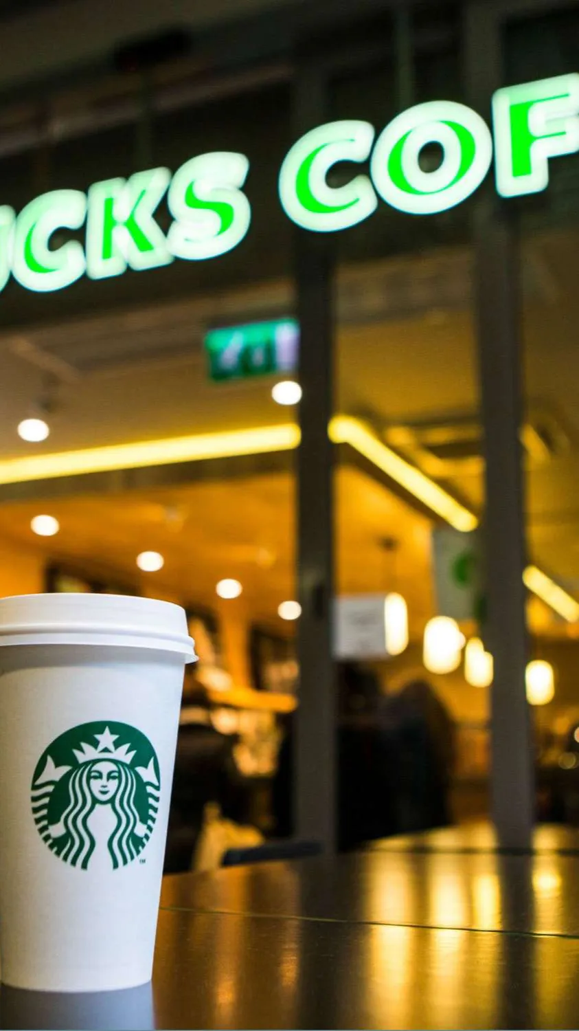 ai character: Starbucks in ST background