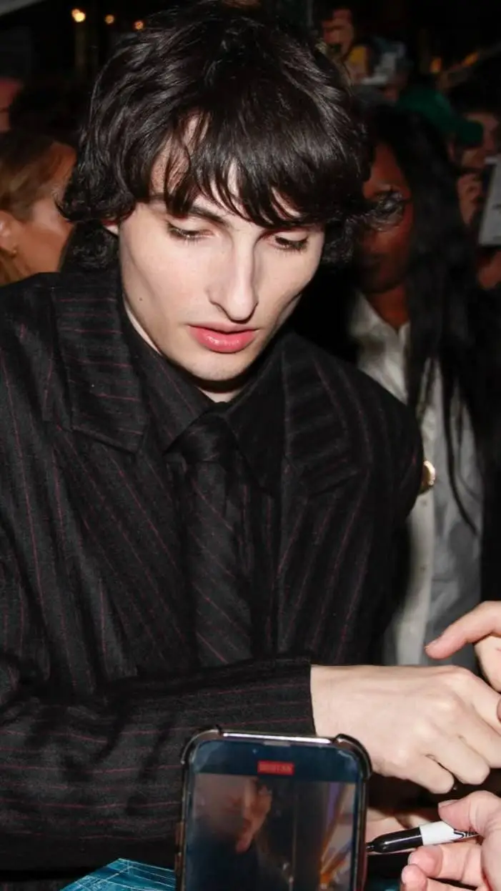 ai character: Finn Wolfhard background