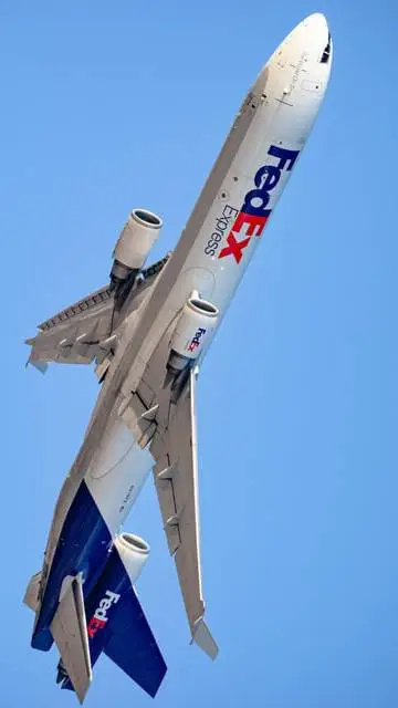 ai character: FedEx MD-11 background