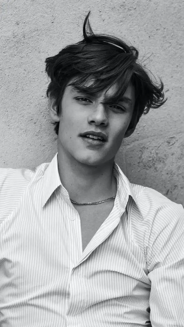 ai character: louis partridge  background