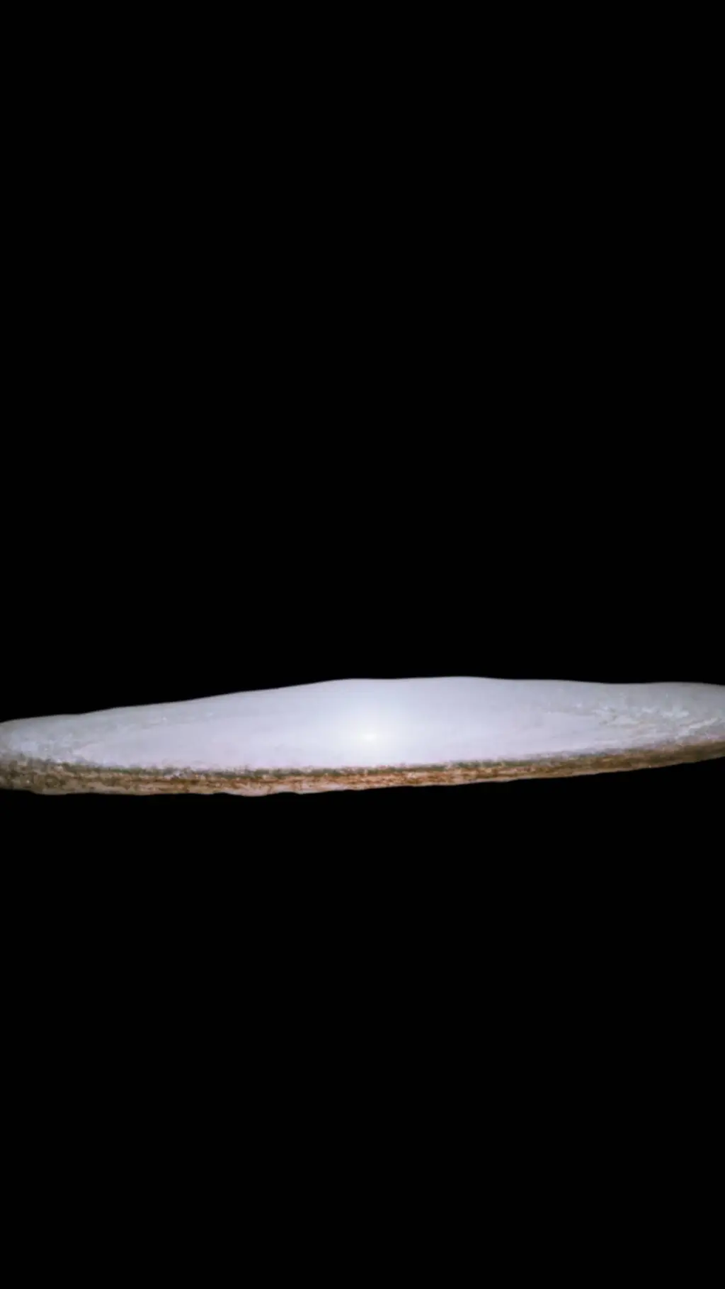 ai character: Sombrero Galaxy background