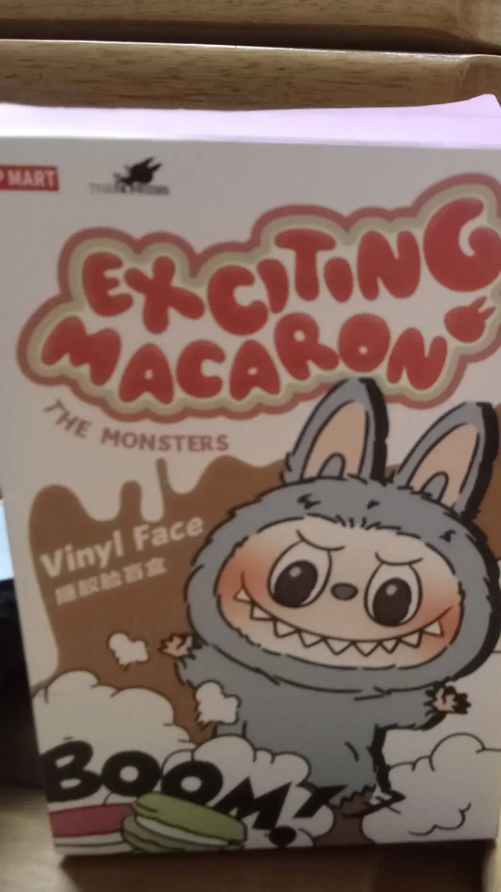 ai character: UNBOX A LABUBU background