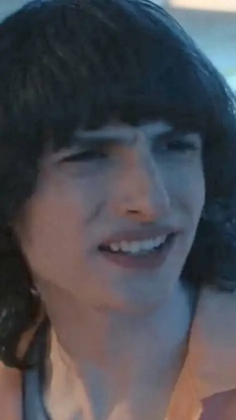 ai character: finn wolfhard  background