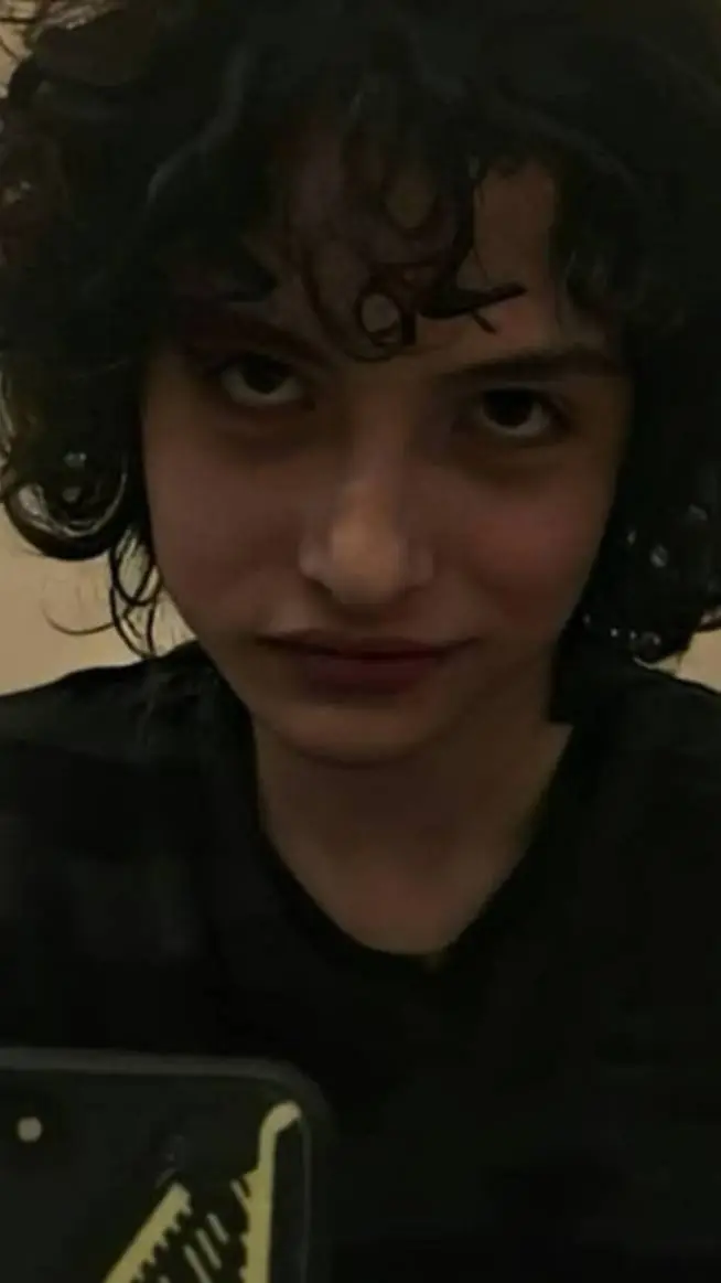 ai character: finn wolfhard  background