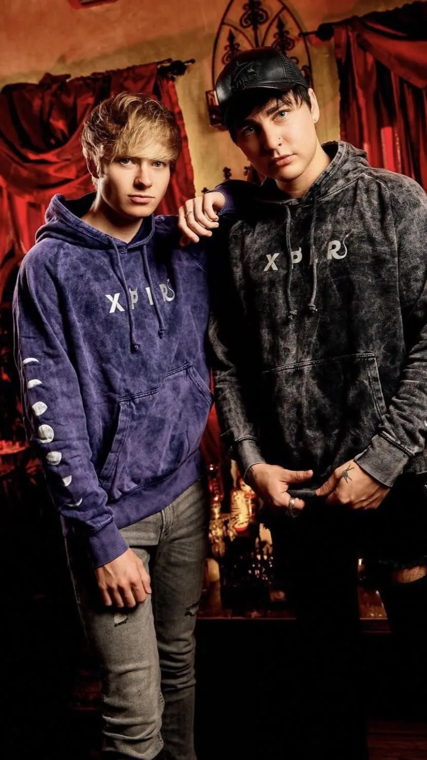 ai character: Sam & Colby  background