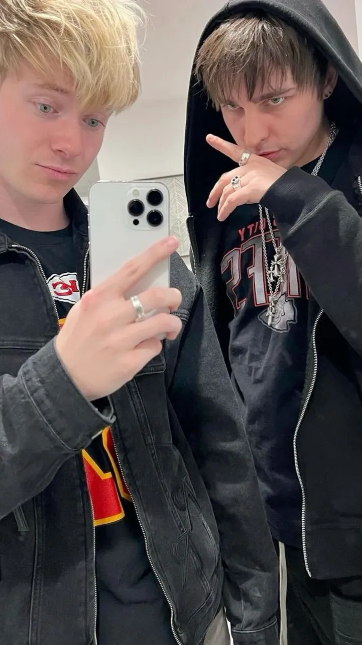 ai character: Sam & Colby  background