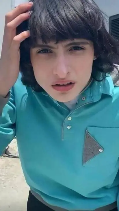 ai character: Finn wolfhard  background
